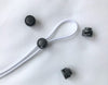 The Function of Cord Stoppers on Hoodies, Jackets, and Bags