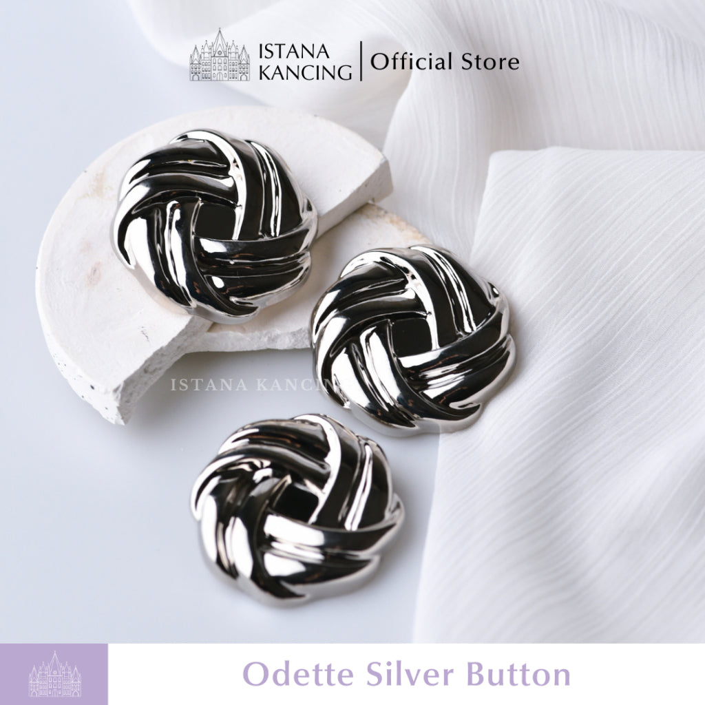 Odette Button